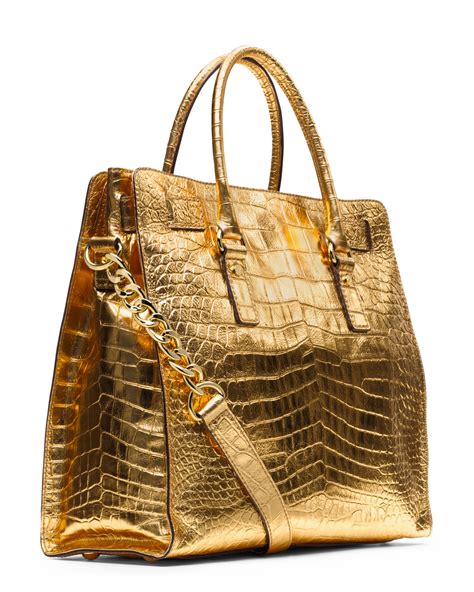 michael kors oro|Michael Kors large gold tote.